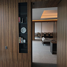 Rusell Reynolds pivot doors, paneling, long view Rusell Reynolds pivot doors, paneling, long view